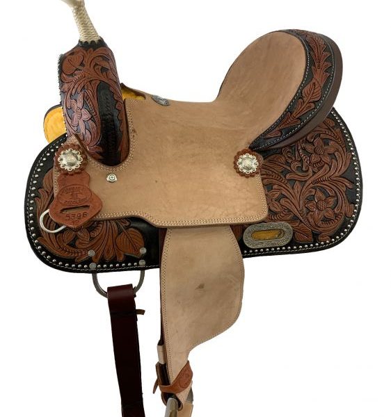 12" Double T Youth barrel style hard seat saddle with a two-tone floral tooling